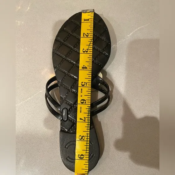 Chanel  Camelia Black and Ivory flip flops 38