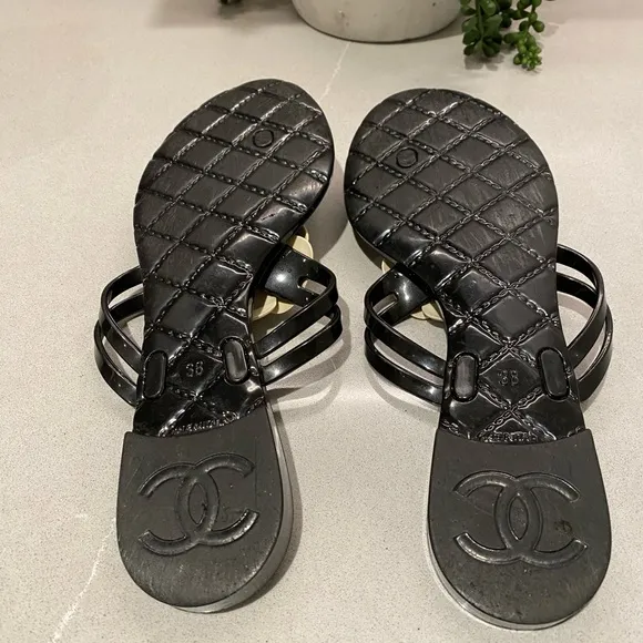 Chanel  Camelia Black and Ivory flip flops 38