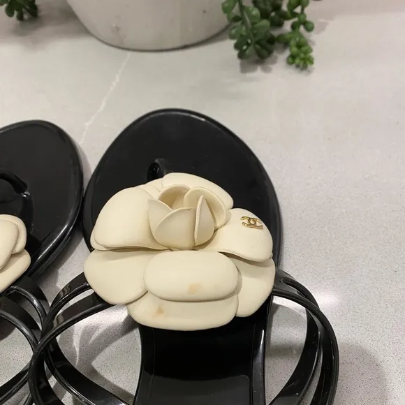 Chanel  Camelia Black and Ivory flip flops 38