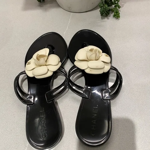 Chanel  Camelia Black and Ivory flip flops 38