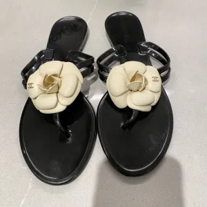 Chanel  Camelia Black and Ivory flip flops 38