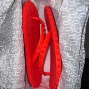 Christian Louboutin Rubber Flip Flops