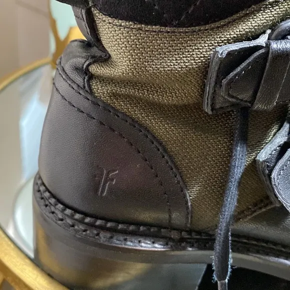 Frye women’s black leather and green canvas combat boots. Size 5 /12