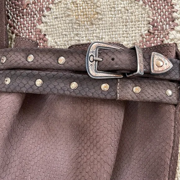 Karma of Charme tall boots in chocolate snake print leather. New from Sundance.