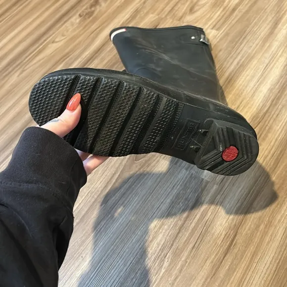 Matte black tall hunter boots