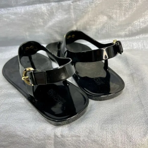 Michael Kors Mira Black Jelly Thong Sandals with Gold Lock Accent Women’s Size 9