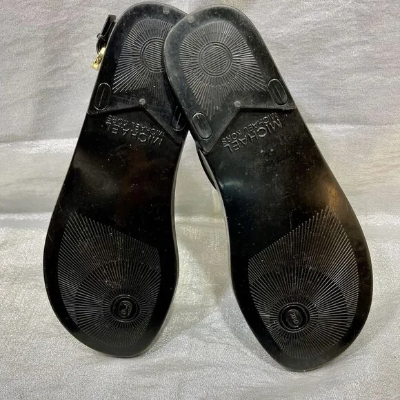 Michael Kors Mira Black Jelly Thong Sandals with Gold Lock Accent Women’s Size 9