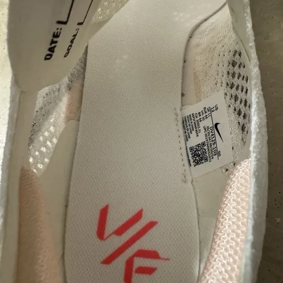 Nike White and Pink Athletic Shoes with Breathable Mesh