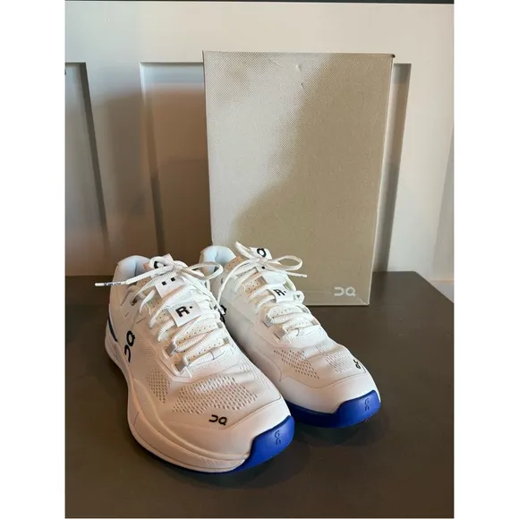 On Running Blue and White Athletic Shoes with Cloud Cushioning