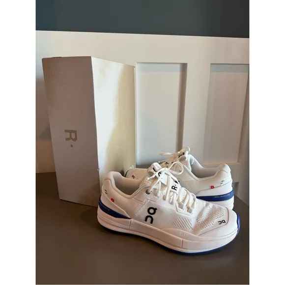 On Running Blue and White Athletic Shoes with Cloud Cushioning