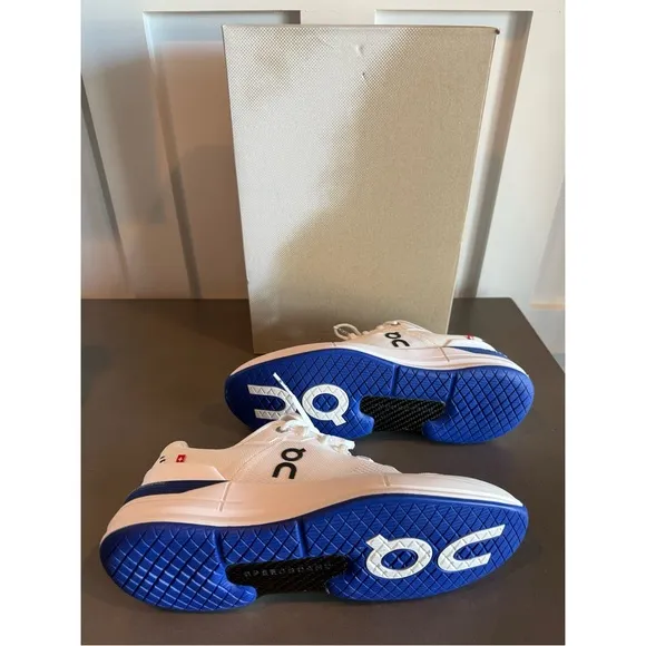 On Running Blue and White Athletic Shoes with Cloud Cushioning