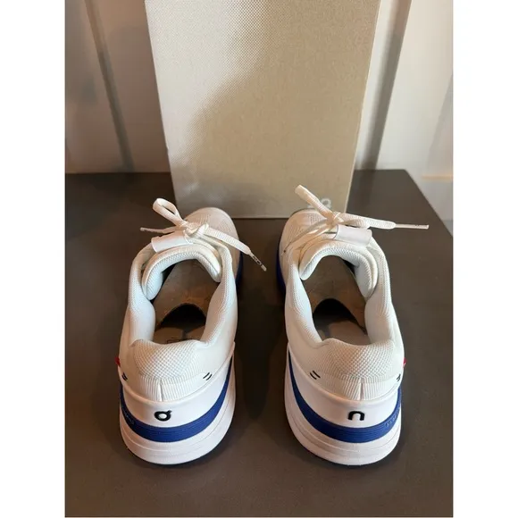 On Running Blue and White Athletic Shoes with Cloud Cushioning