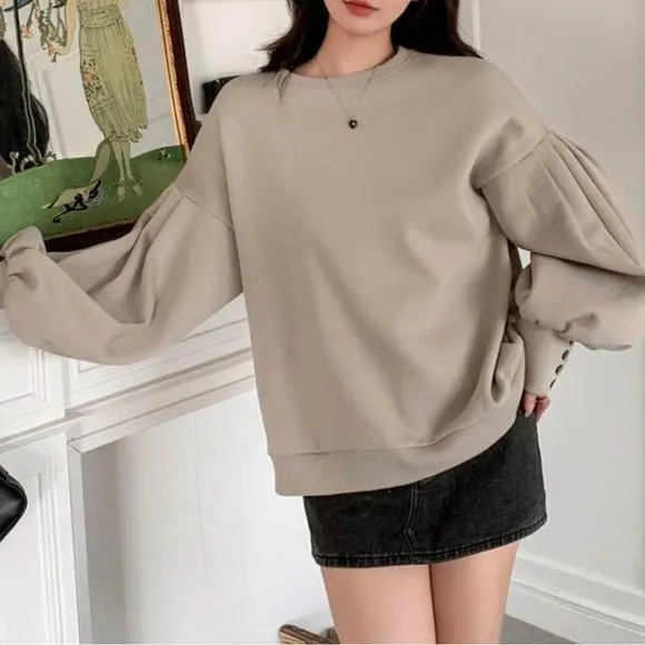 Puff sleeve oversized crew neck pullover sweater with button wrist detail