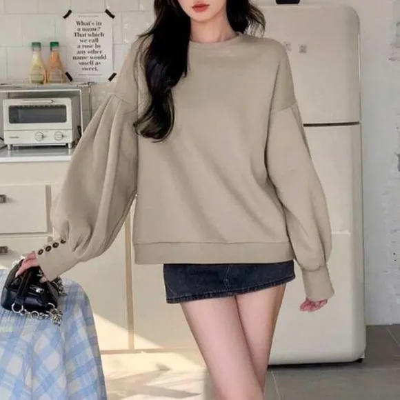 Puff sleeve oversized crew neck pullover sweater with button wrist detail