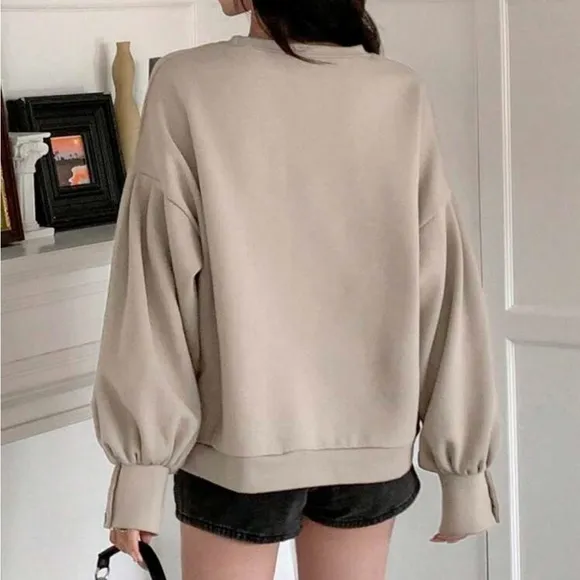 Puff sleeve oversized crew neck pullover sweater with button wrist detail