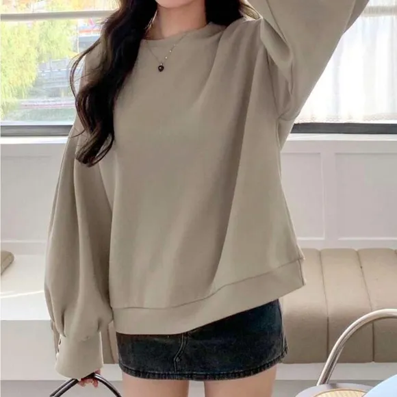 Puff sleeve oversized crew neck pullover sweater with button wrist detail