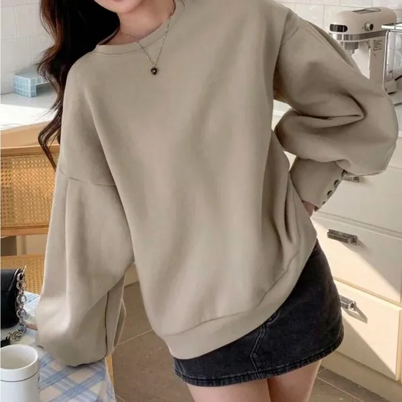 Puff sleeve oversized crew neck pullover sweater with button wrist detail