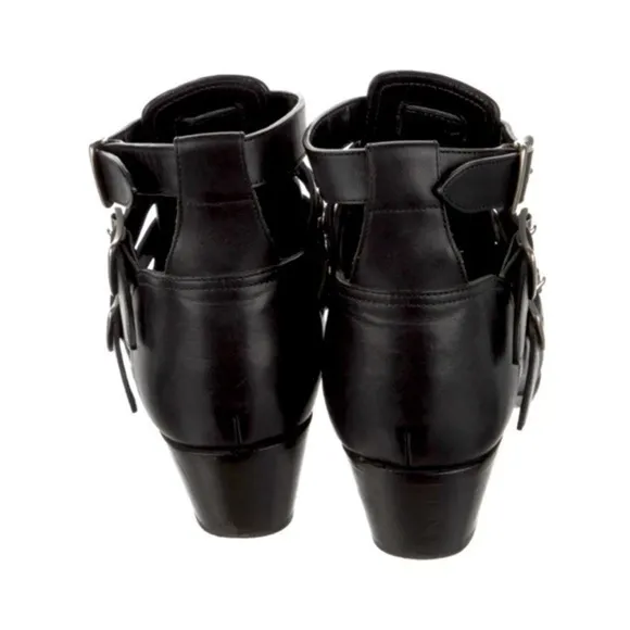 Saint Laurent. Triple buckle leather studded ankle boots